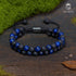 Natürliches Perlenarmband aus Lapis Lazuli und Lavastein auf Moos – Schmuck für Achtsamkeit, Balance und Erdung